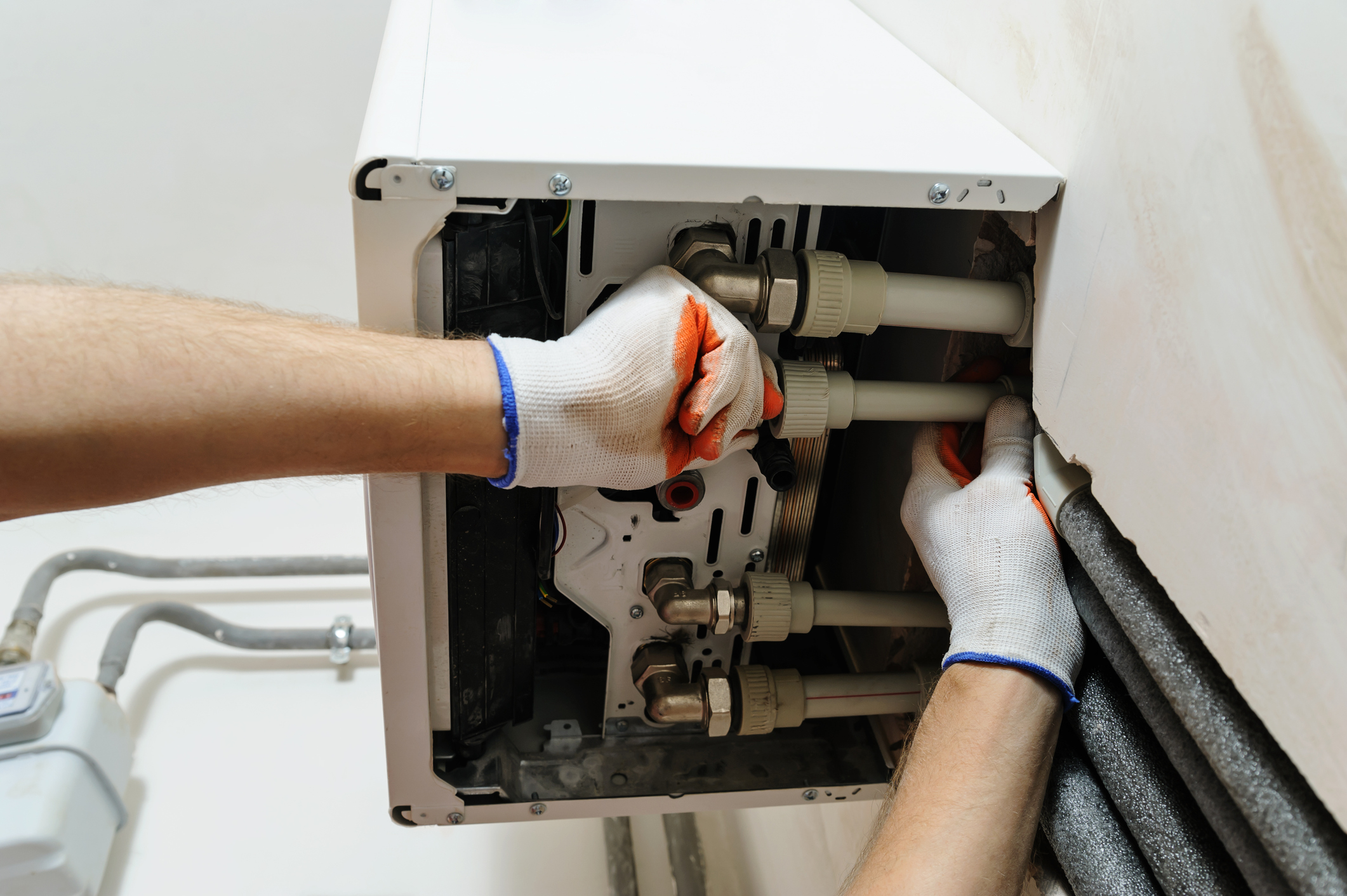 technician working on heating unit