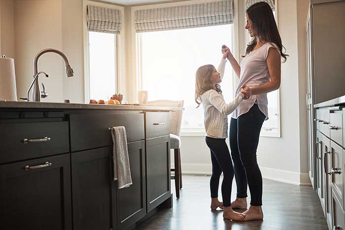 mother and daughter dancing